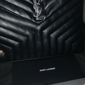 1. YSL oversized pouch/document holder